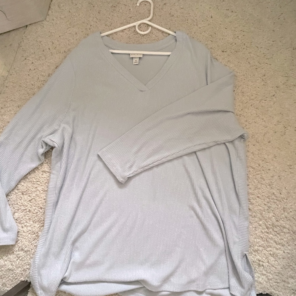 V-neck knit sweater.